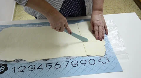 Cut dough into squares Video stock 25594797