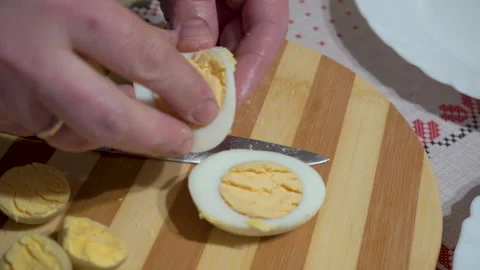 Cut the egg Stock Footage 168290629