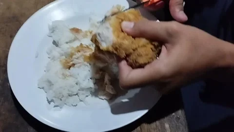 Cut the flour chicken using small scissors Stock Footage 224487544