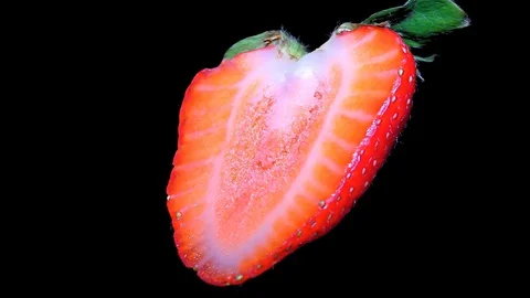 Cut Fresh Strawberry on Black Background – close up, detail Stock Footage 90804062