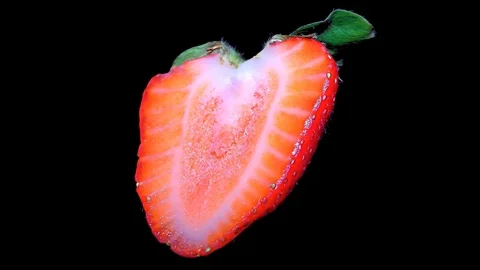 Cut Fresh Strawberry on Black Background – close up, detail Stock Footage 90804073