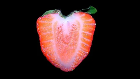 Cut Fresh Strawberry on Black Background – close up, detail Stock Footage 90804171