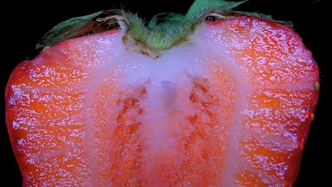 Cut Fresh Strawberry on Black Background – close up, detail Stock Footage 90804200