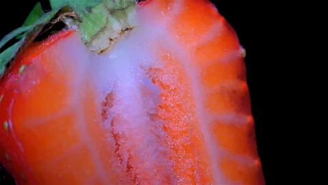 Cut Fresh Strawberry on Black Background – close up, detail Vidéo 90804202