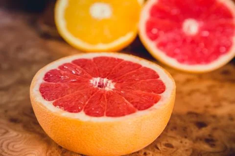 Cut fruit on the kitchen table Stock Photos