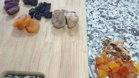 Cut Fruit On White Surface By Knife Stockbeeldmateriaal 91791553