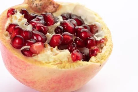 Cut garnet, half fruit close up 스톡 사진