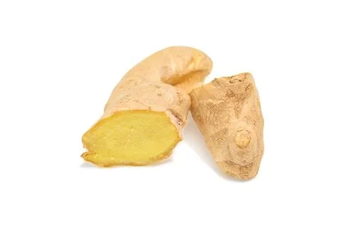 Cut ginger root on an isolated white background Stock Photos