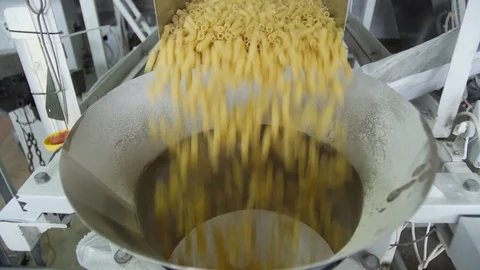 Cut goods, Mostaccioli, paste cutting, Noodle product Stock Footage 75217705