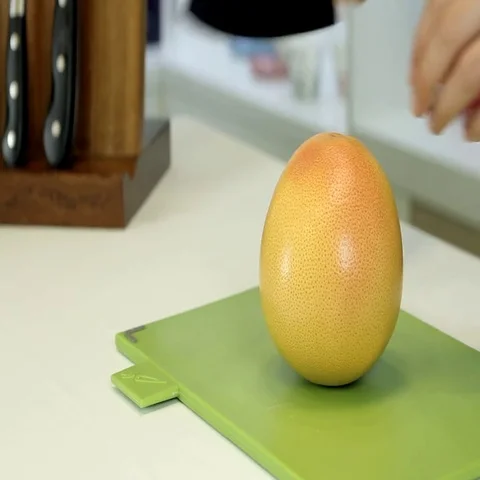 To cut a grapefruit Stock Footage 69609365