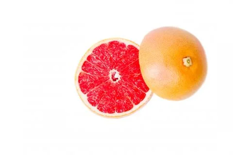 Cut grapefruit on a white background Stock Photos