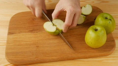 Cut a green apple Stock Footage