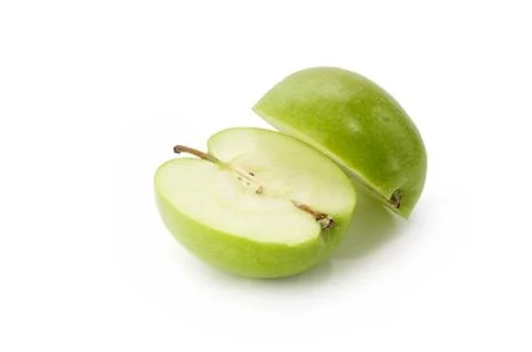 Cut green apple Stock Photos