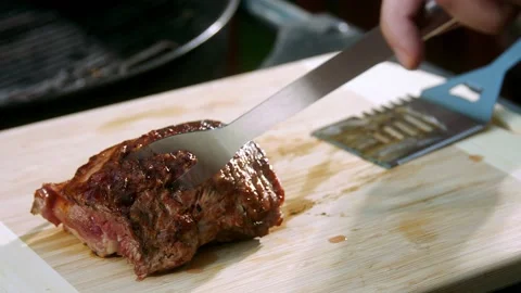 Cut grill meat slow motion Stock Footage 233004882