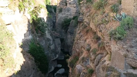 The cut of the Guadalevín River as it passes through the town of Ronda, Spain Stock Footage 344577711