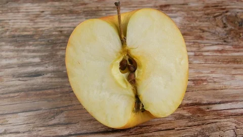 Cut half an Apple close up Stock Footage 102185009