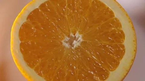 Cut in half an orange. Large Stock Footage 68622323