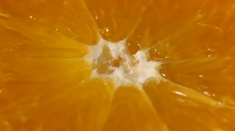 Cut in half an orange. Macro Stock Footage 68622297