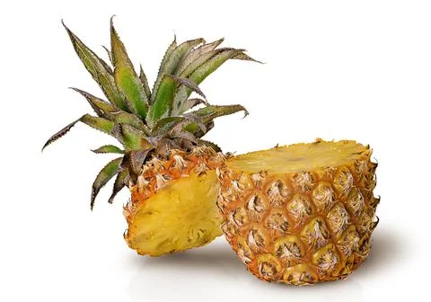 Cut in half pineapple isolated on white Stock Photos