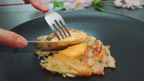 Cut in half potato casserole with egg Stock Footage 249930760