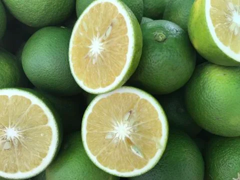Cut in a half sweet orange Stock Photos