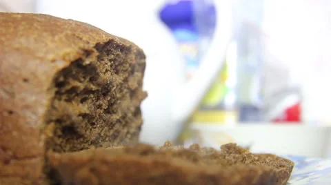 Cut the hot fresh bread Stock Footage 61352156