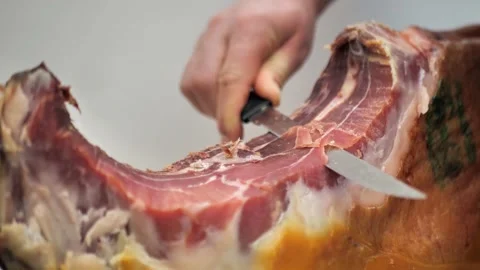 Cut juicy appetizing jamon, close-up Stock Footage 230307376