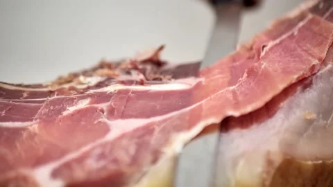 Cut juicy appetizing jamon, close-up Video stock 232339414
