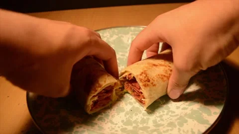 Cut a Kebab into two pieces Stock Footage 256571376