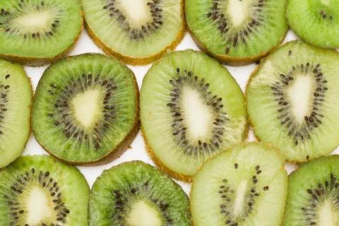 Cut kiwi fruit. Close-up background texture Stock Photos