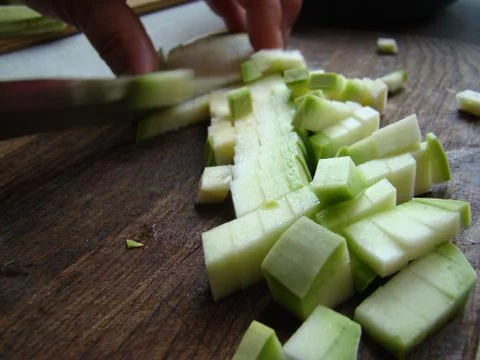 To cut with a knife Stock Photos