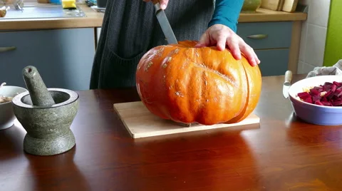 Cut a large pumpkin Video stock 59727031