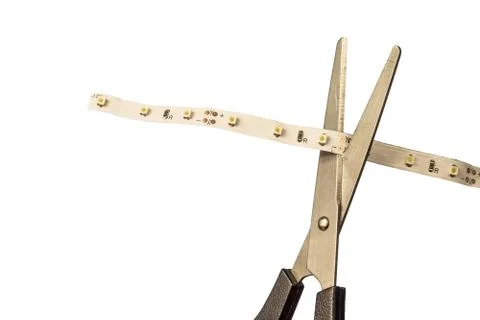 Cut LED strip with scissors Stock Photos
