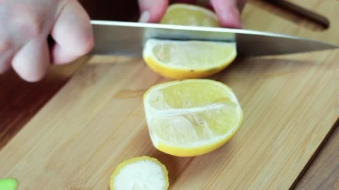 Cut a lemon Stock Footage 154552570