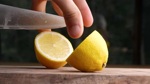 Cut the lemon Stock Footage 231657642