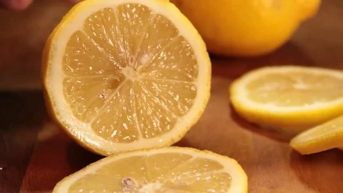 Cut the lemon with a knife Stock Footage 79405037