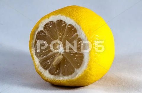 Cut of lemon on a white background Stock Photos