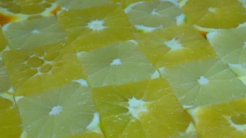 Cut up lemons and oranges rotate. C0374 Stock Footage 255573842