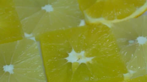 Cut up lemons and oranges rotate. C0376 Stock Footage 255573847