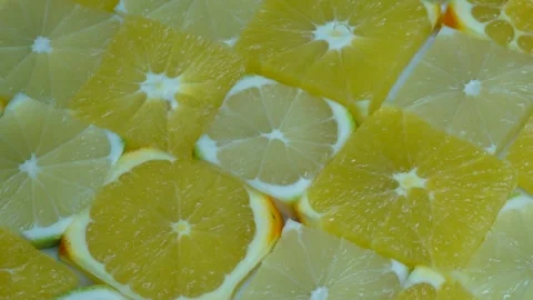 Cut up lemons and oranges rotate. C0375 Stock Footage 255573848