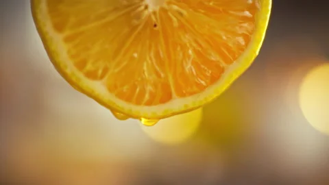 A cut lemons interior is revealed in extreme macro detail showcasing seeds a Stock Footage 331312170