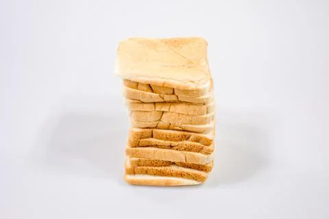 The cut loaf of bread with reflection isolated on white Stock Photos