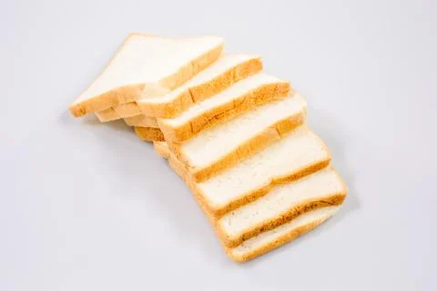 The cut loaf of bread with reflection isolated on white Stock Photos