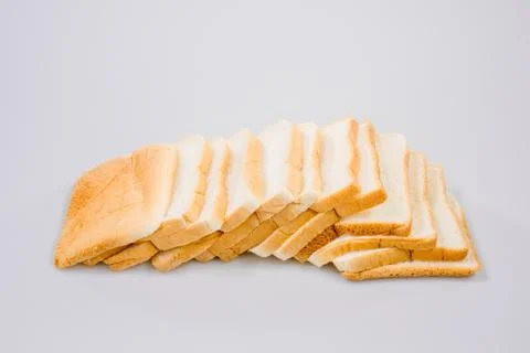 The cut loaf of bread with reflection isolated on white Stock Photos