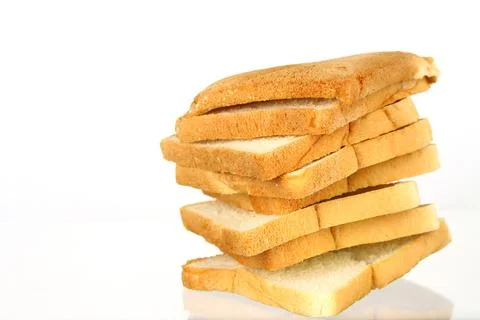 The cut loaf of bread with reflection isolated on white Stock Photos