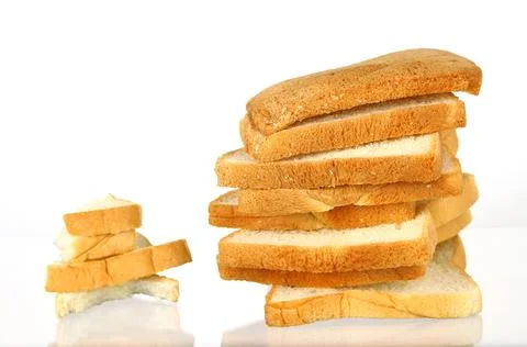 The cut loaf of bread with reflection isolated on white Stock Photos