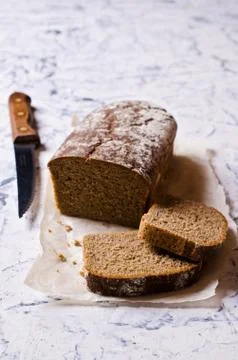 Cut loaf of rye bread Stock Photos