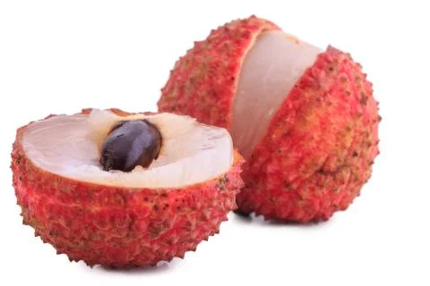 Cut lychee isolated on white Stock Photos