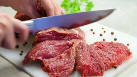 Cut meat in white kitchen Stock Footage 166212814