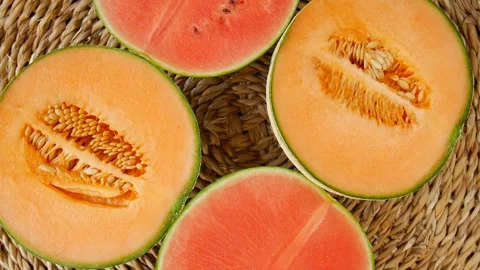 Cut melon watermelon on the table. Video stock 297352044